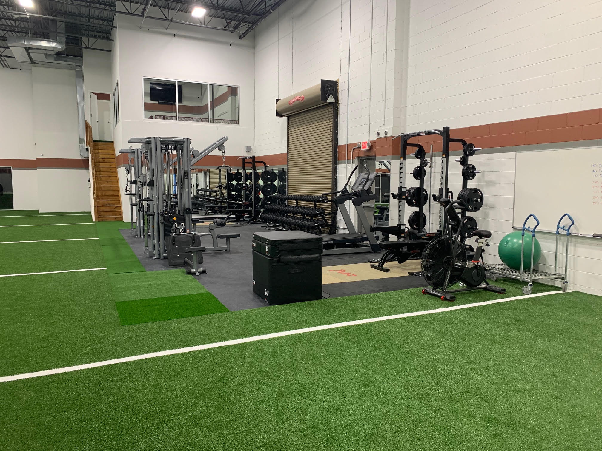 fitness facility workout equipment turf